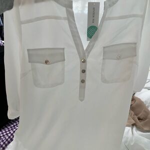 White blouse with tags
